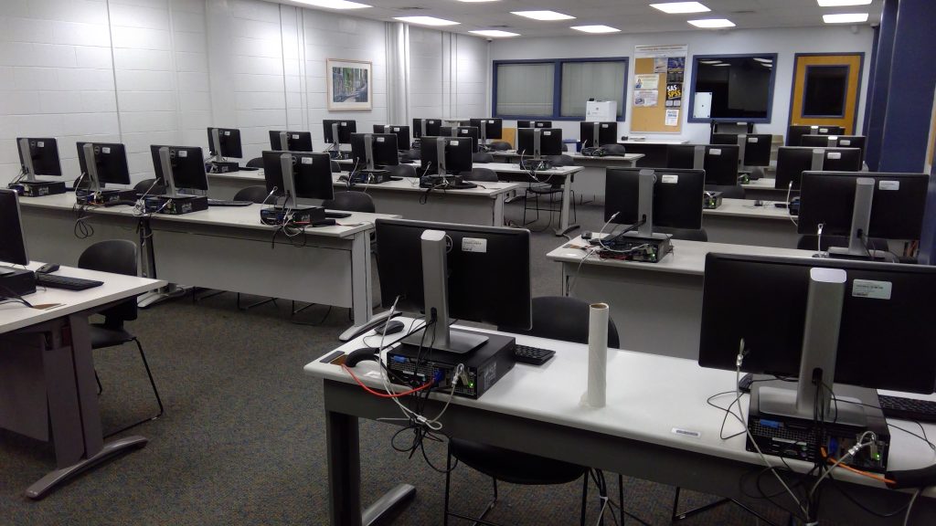 View of computer stations in the room.